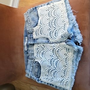 Iris Jean shorts with cream crochet design on the front. Sz. 5.
